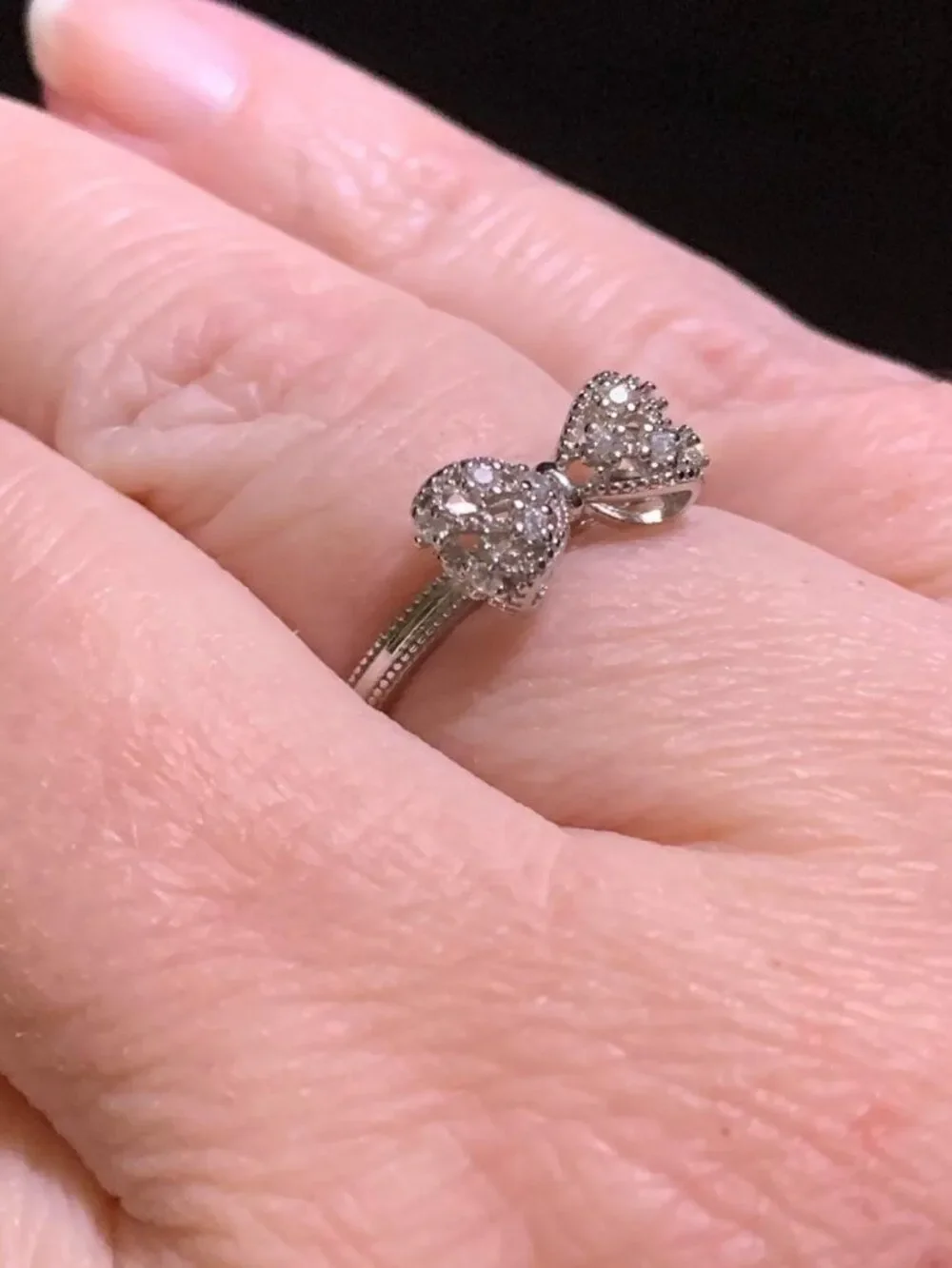 .925 Sterling Silver with White Diamond Cubic Zirconia Infinity Forever Bow Ring